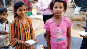 Children getting mid-day meal at Oshi Foundation Bhiwadi