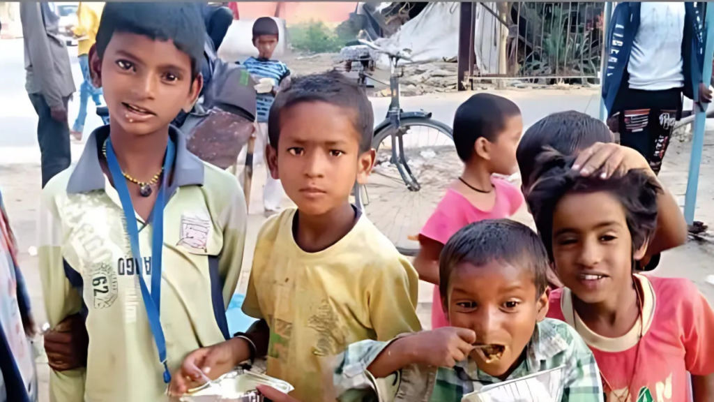 Volunteers from Oshi Foundation distributing food and meals to underprivileged children