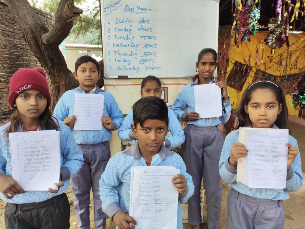 Underprivileged children studying at an education Oshi NGO in Delhi